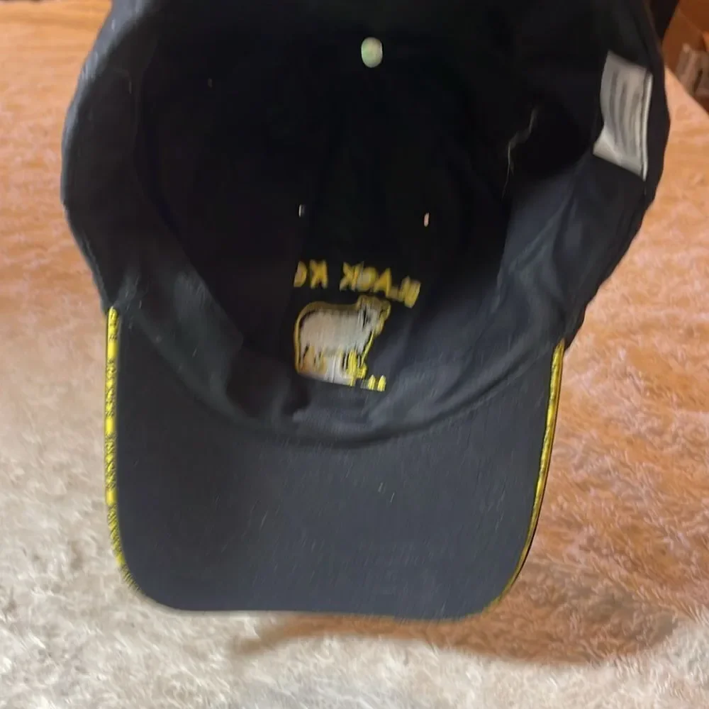 Black Kow the mature, manure hat